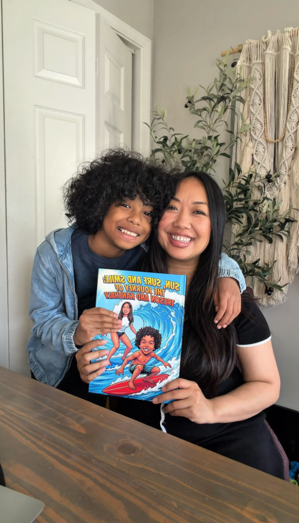 Mom and son holding personalized comic book gift - custom illustrated surfing adventure story