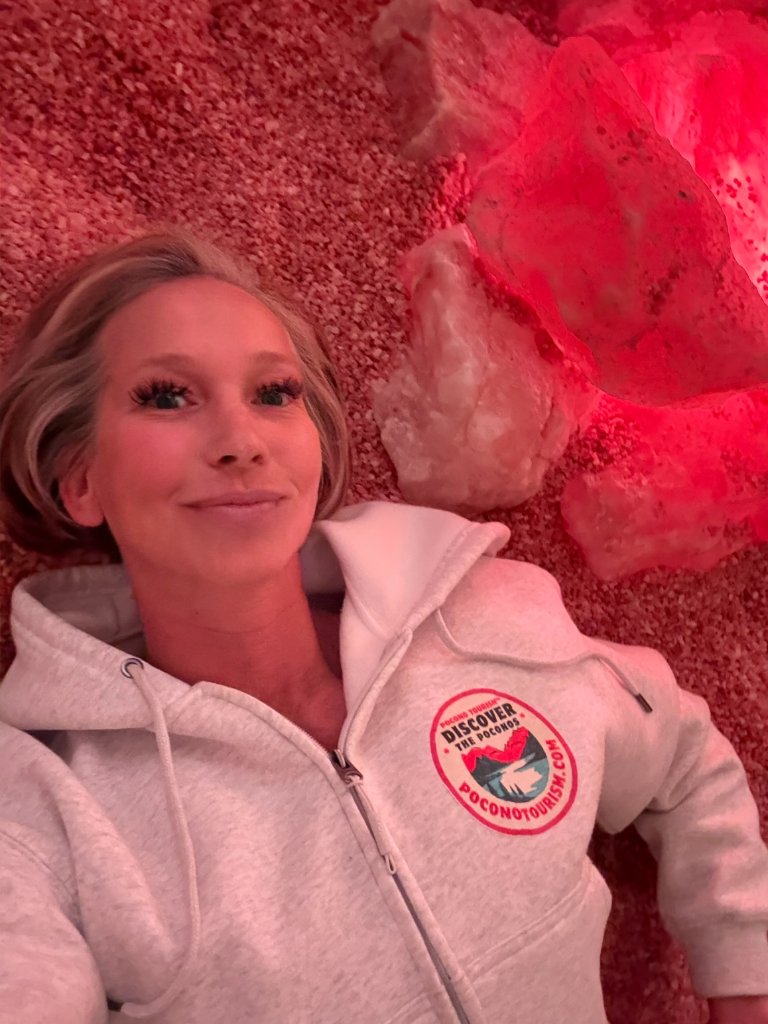 Kara Sincavage relaxing in the salt room at Alchemy Lounge Day Spa