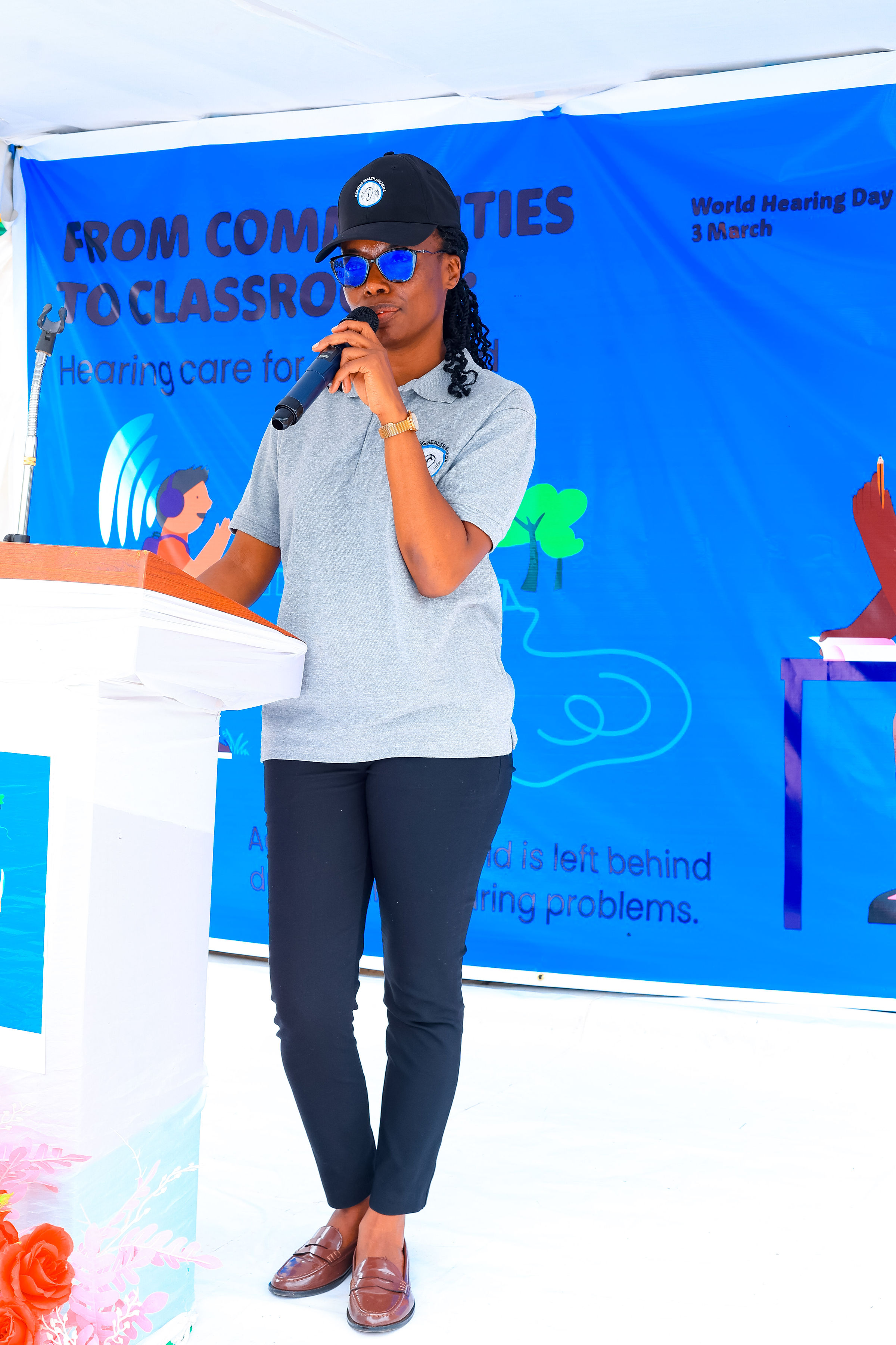 Speaker at the podium at World Hearing Day 2026