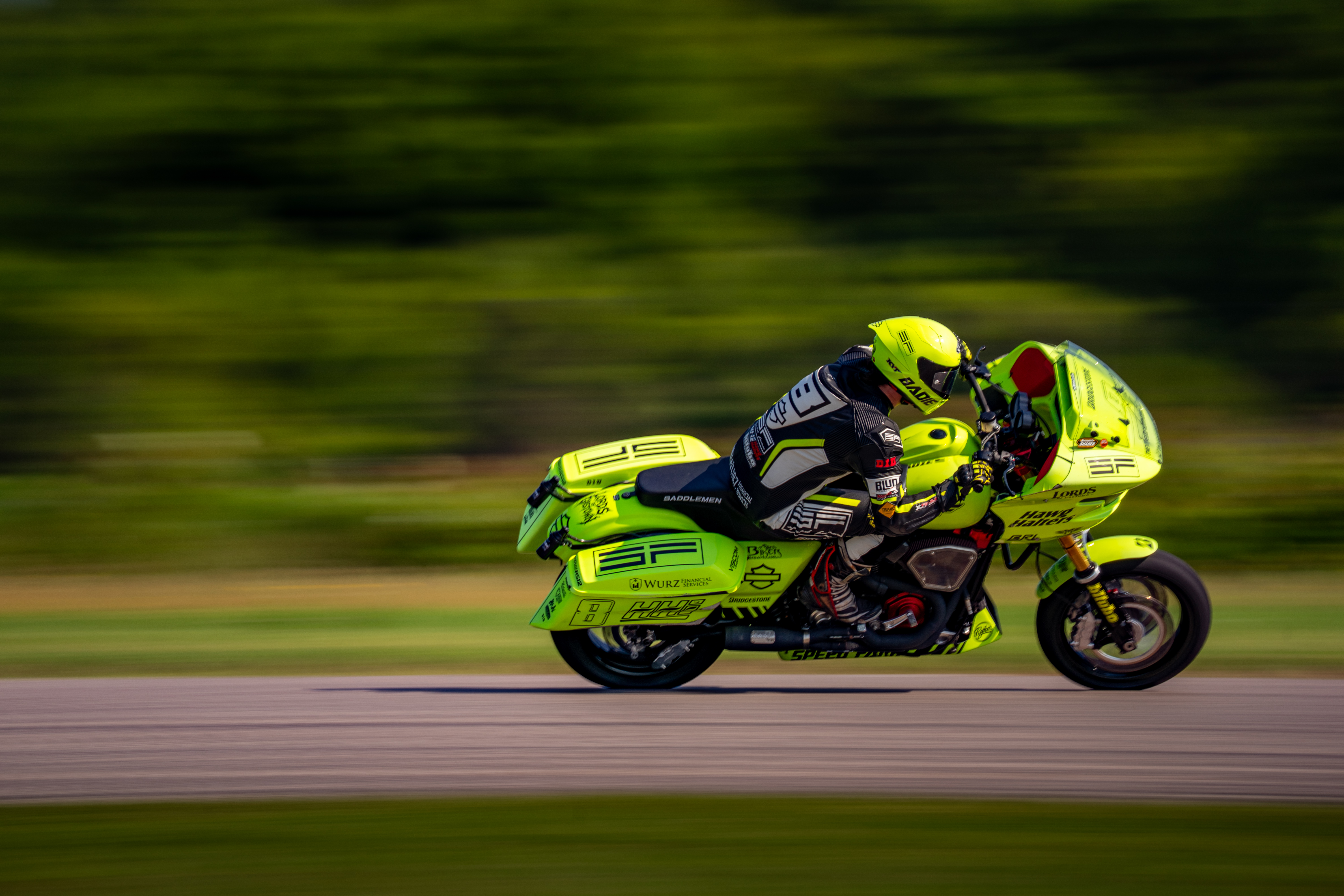 Speed Farm rider on the race bike at speed on track