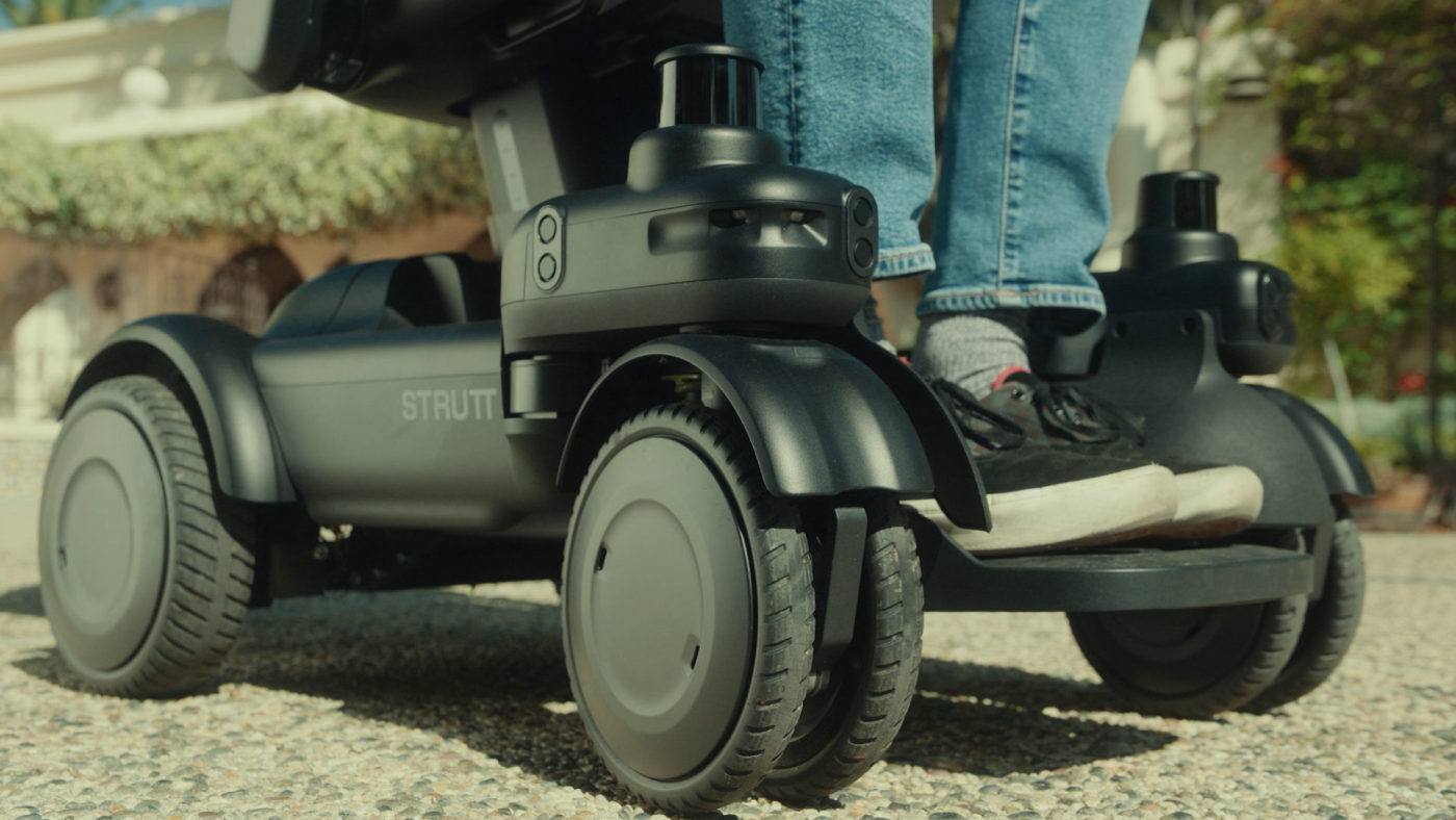 Close view of the Strutt ev¹ Quad-Drive wheel and independent suspension assembly