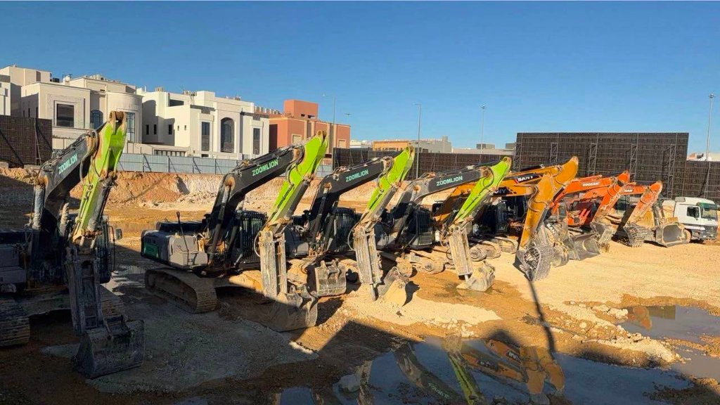 Excavator fleet lined up on site