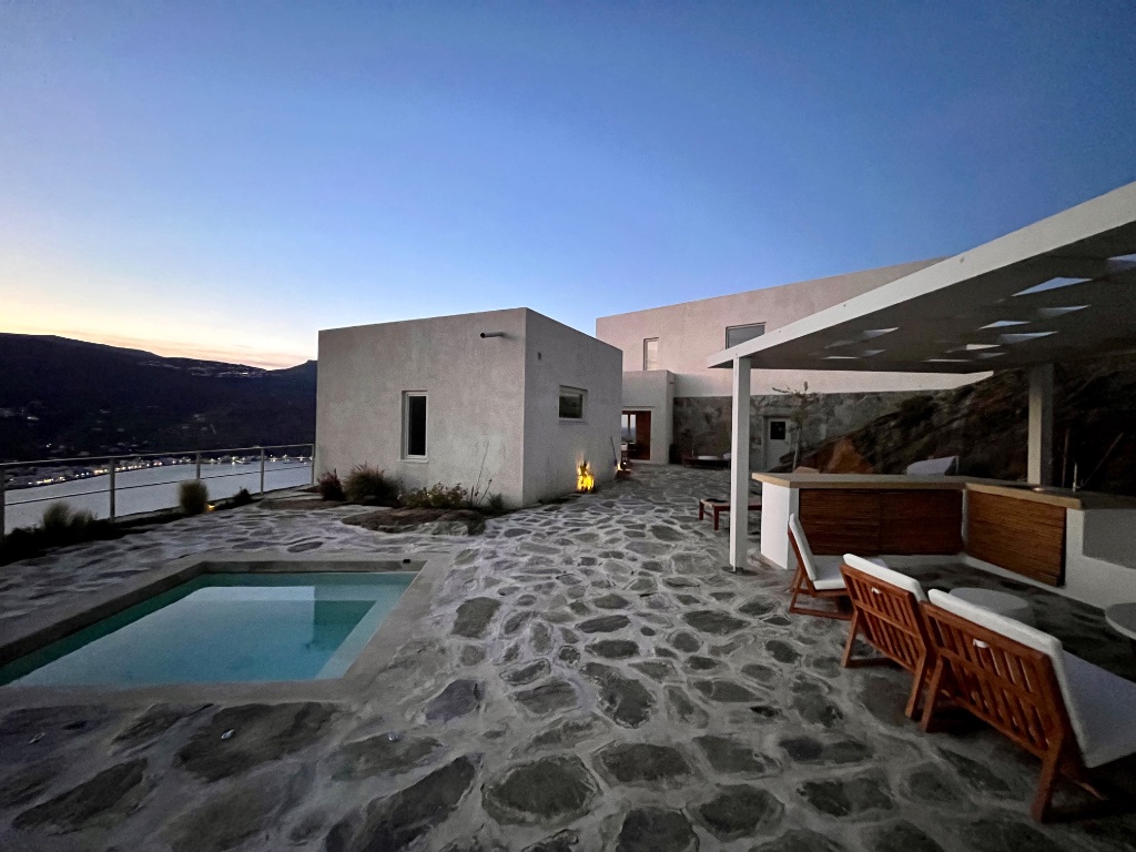 Outdoor terrace and BBQ area at dusk