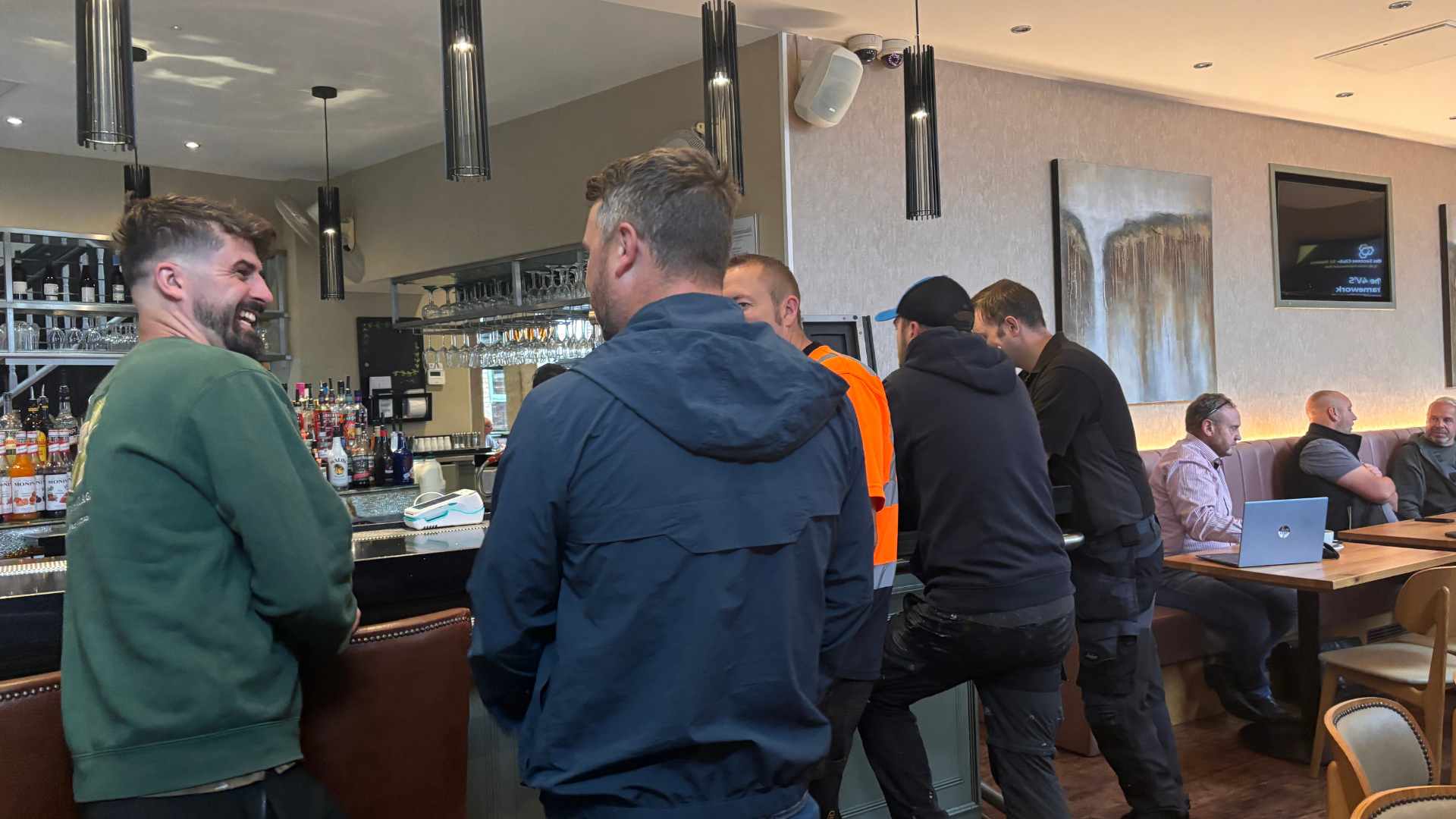 Members relaxing and networking in a pub venue