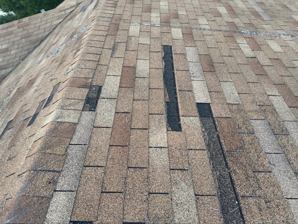 Hurricane damage roof shingles