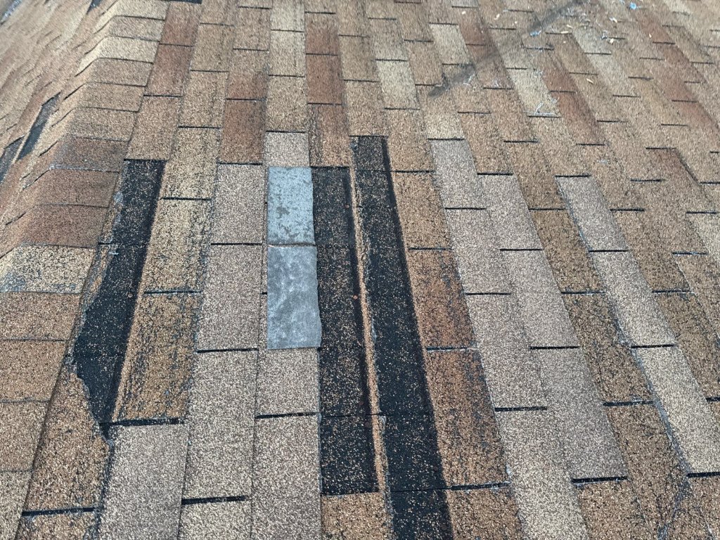 Wind damage roof shingles