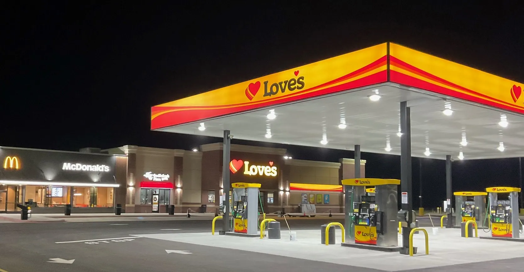 Travel stop welcoming customers at night