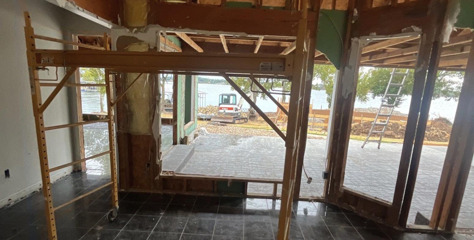Structural remodel with temporary shoring and exterior wall removed.