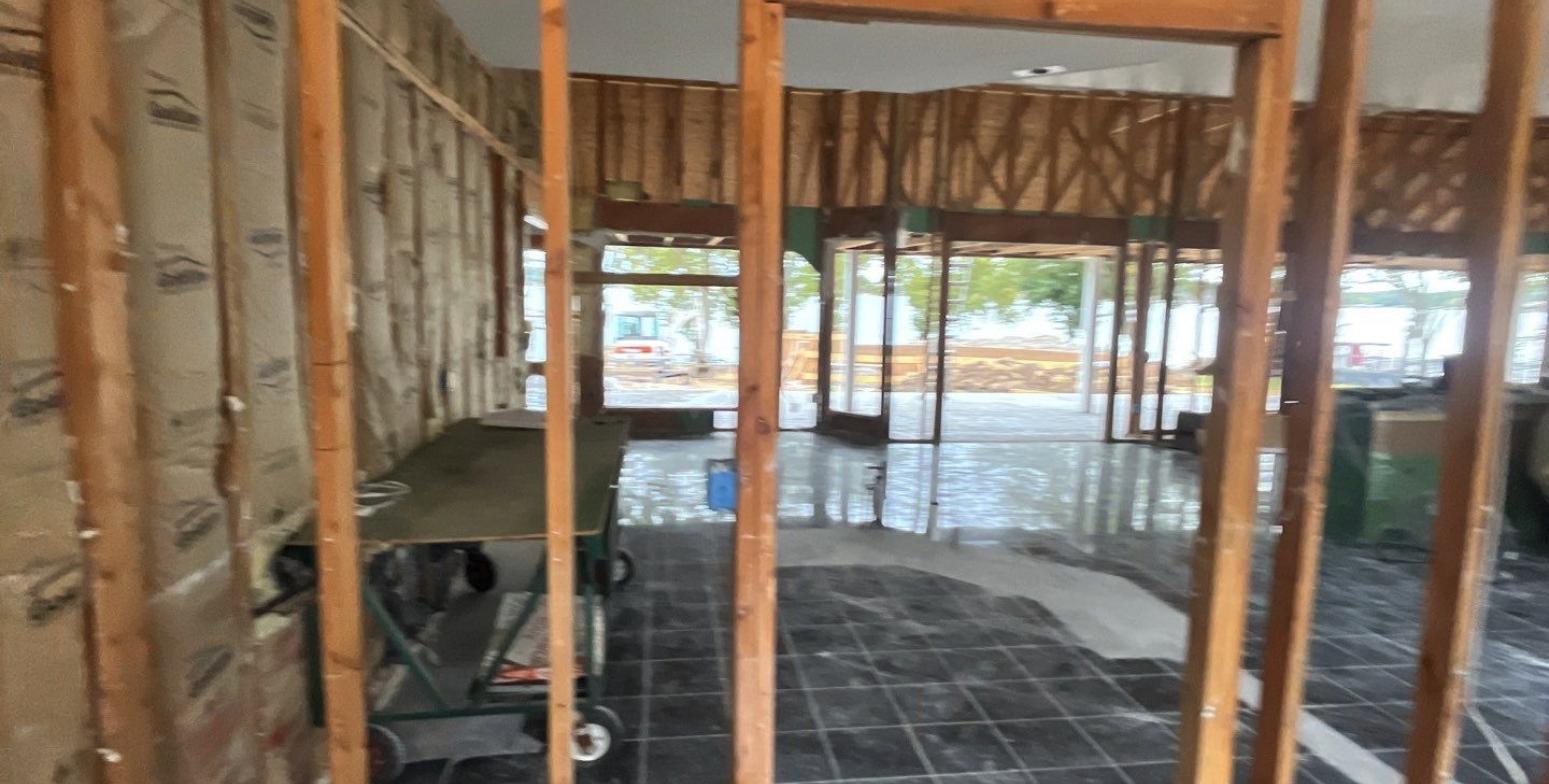 Whole-home interior stripped to the studs during renovation.