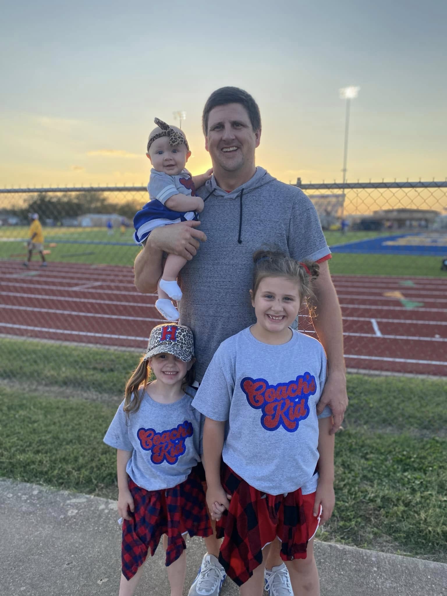 Cooper Crowell with his three daughters