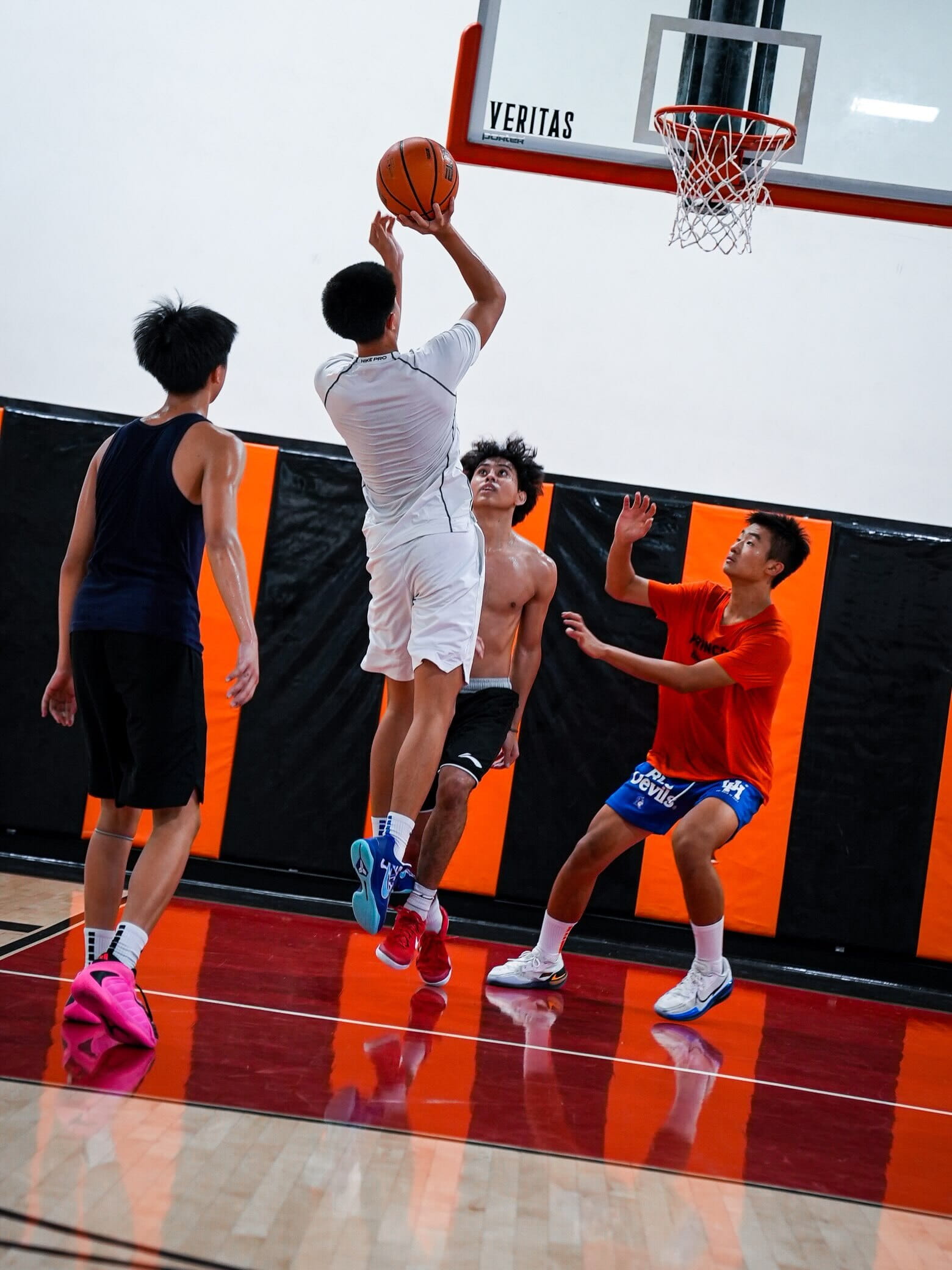 Three players competing during a live drill