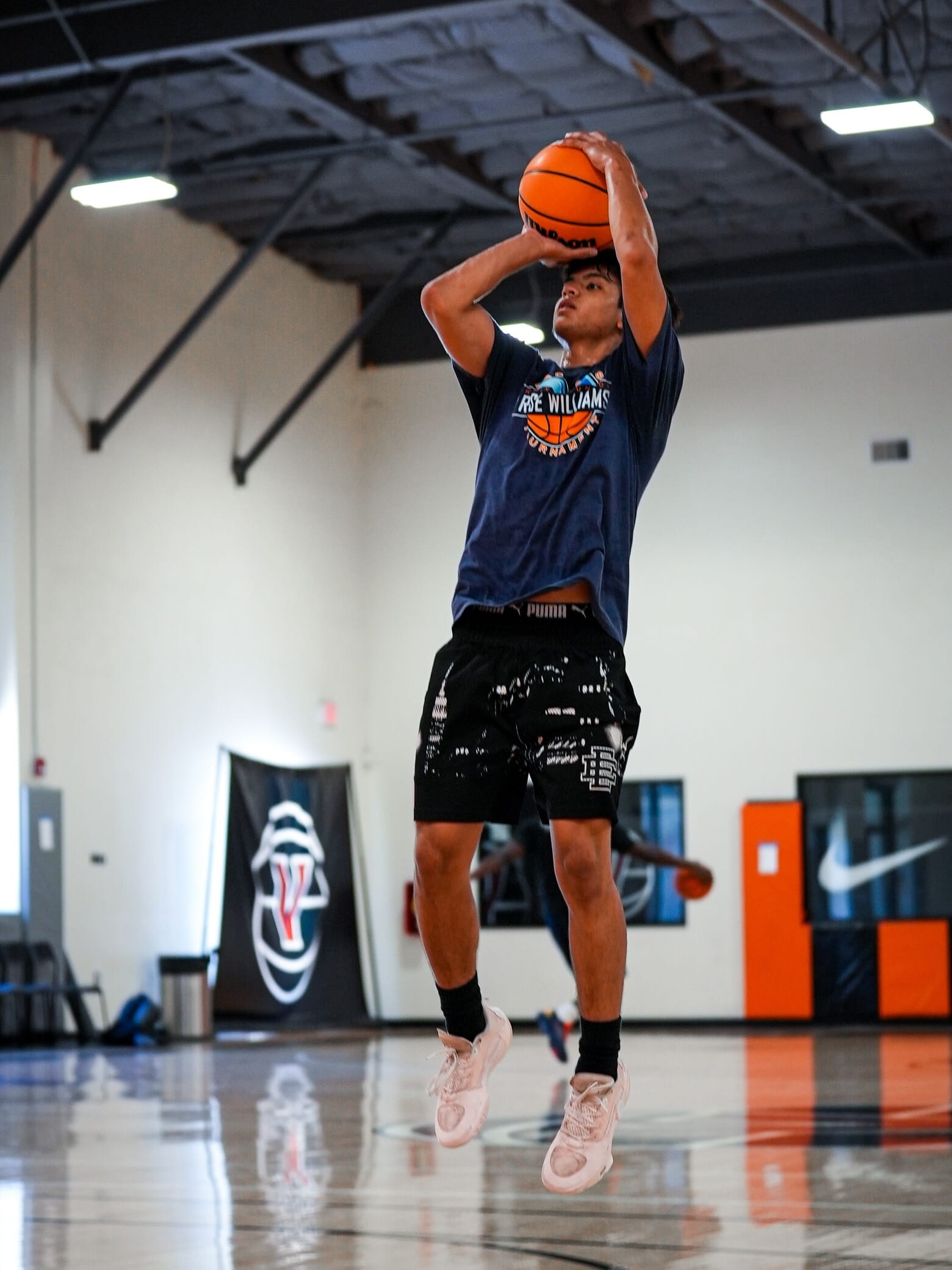 Athlete rising into a jump shot at Velocity HQ