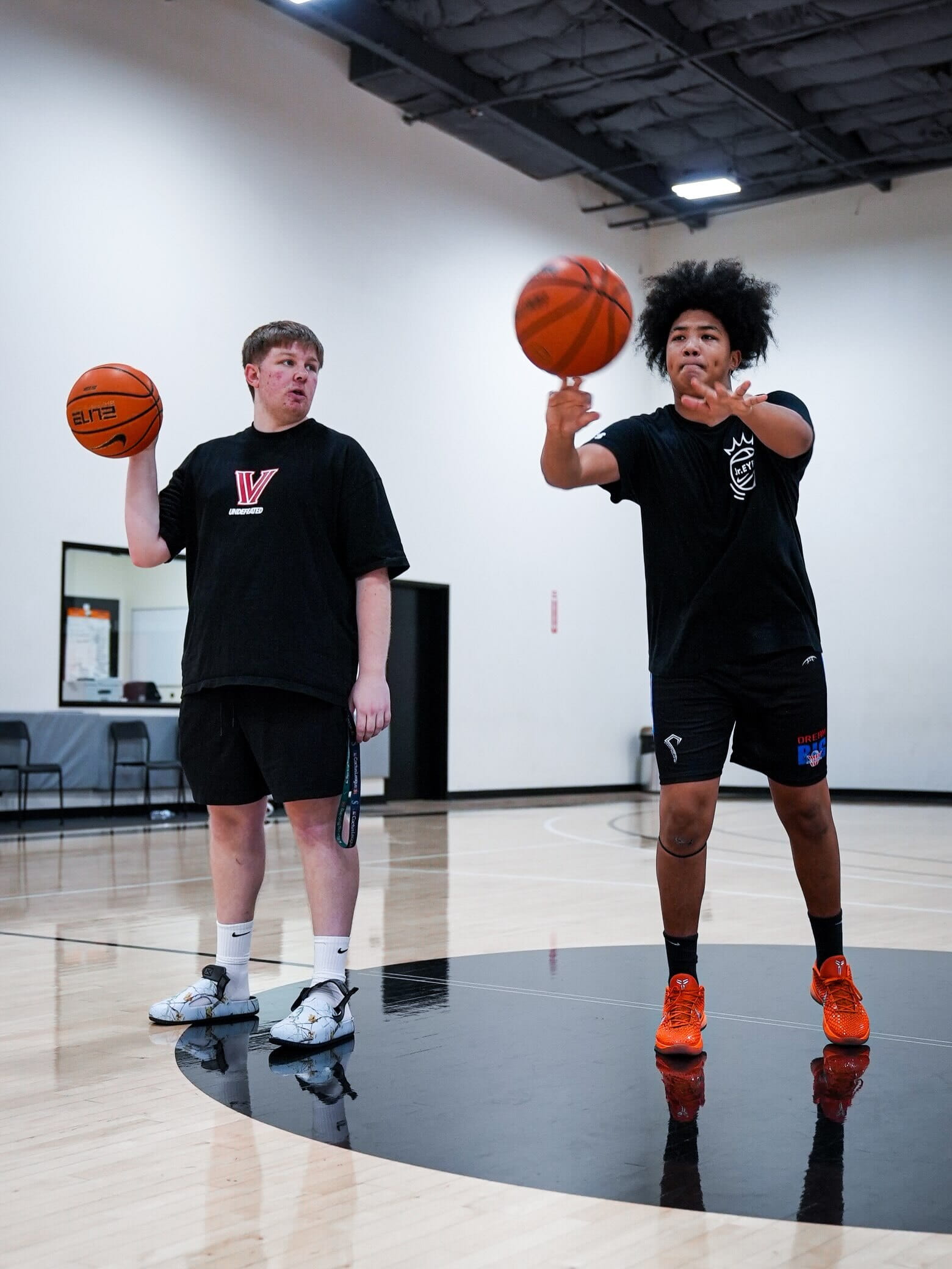 Two Velocity HQ staff members on the court
