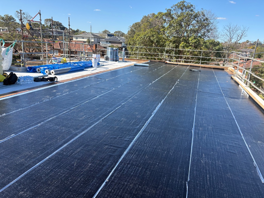 Insulated Flat Roof — Warm Roof with White PVC Membrane
