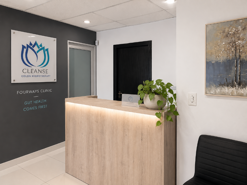 Cleanse Colon Hydrotherapy Fourways reception desk with lotus logo sign
