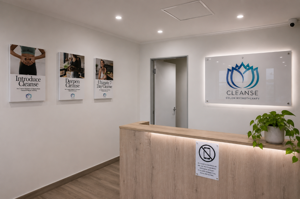 Cleanse reception area with cleanse programme posters and oak desk