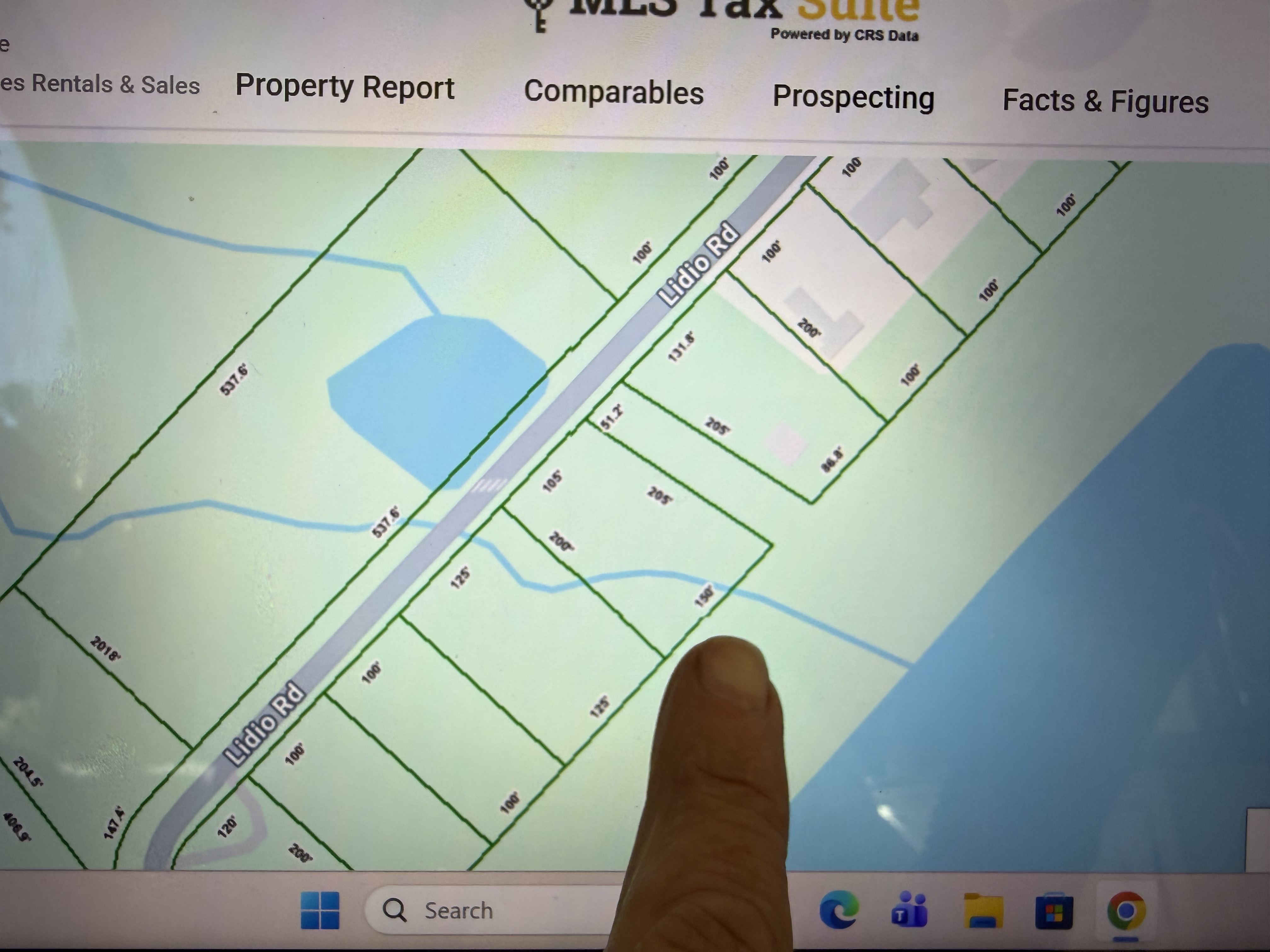 Property map showing Lidio Rd parcels and the stream running through the lot