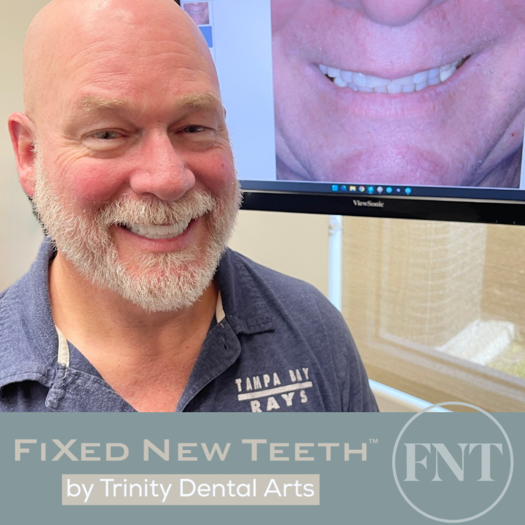 Patient smiling with her before photo on screen — Fixed New Teeth by Trinity Dental Arts, Trinity FL