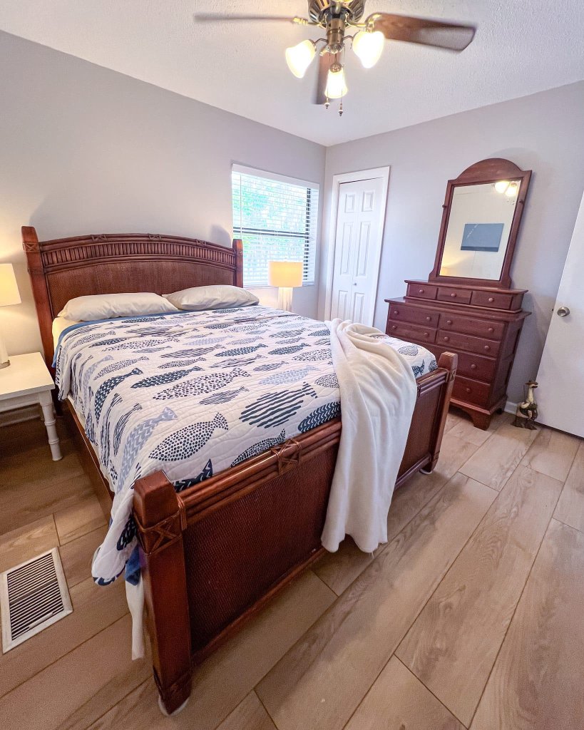 Rattan headboard with dresser and mirror