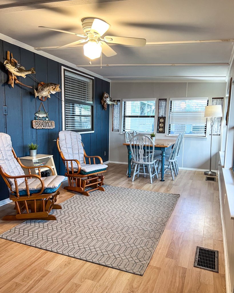 Rocking chairs and dining area with lake views