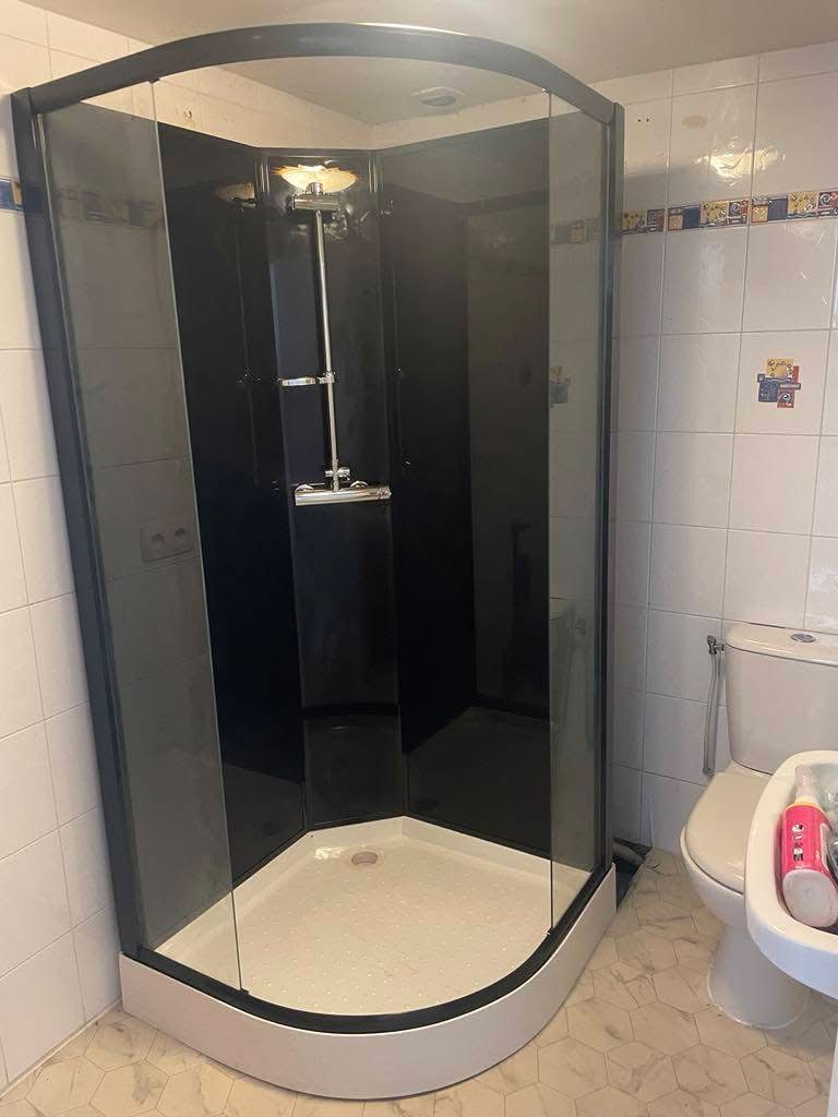 Cabine de douche d'angle avec vitrage fumé