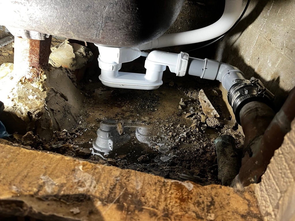 Siphon et joint de raccordement