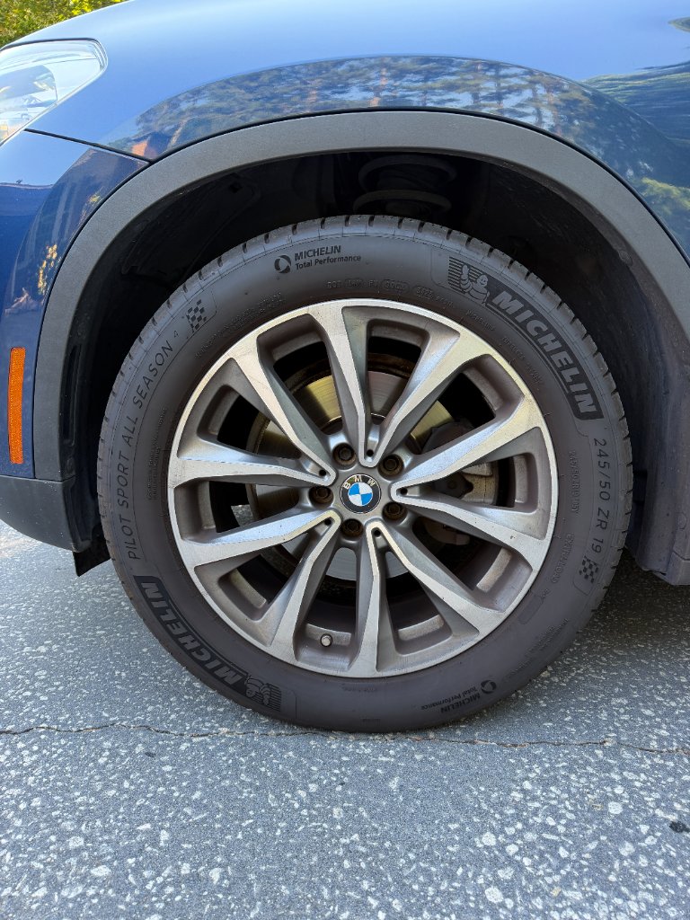 Wheel and tire after cleaning during a complete exterior and interior detail