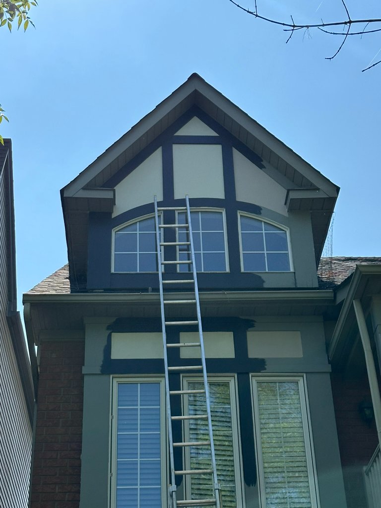 Tudor home exterior with stucco and trim