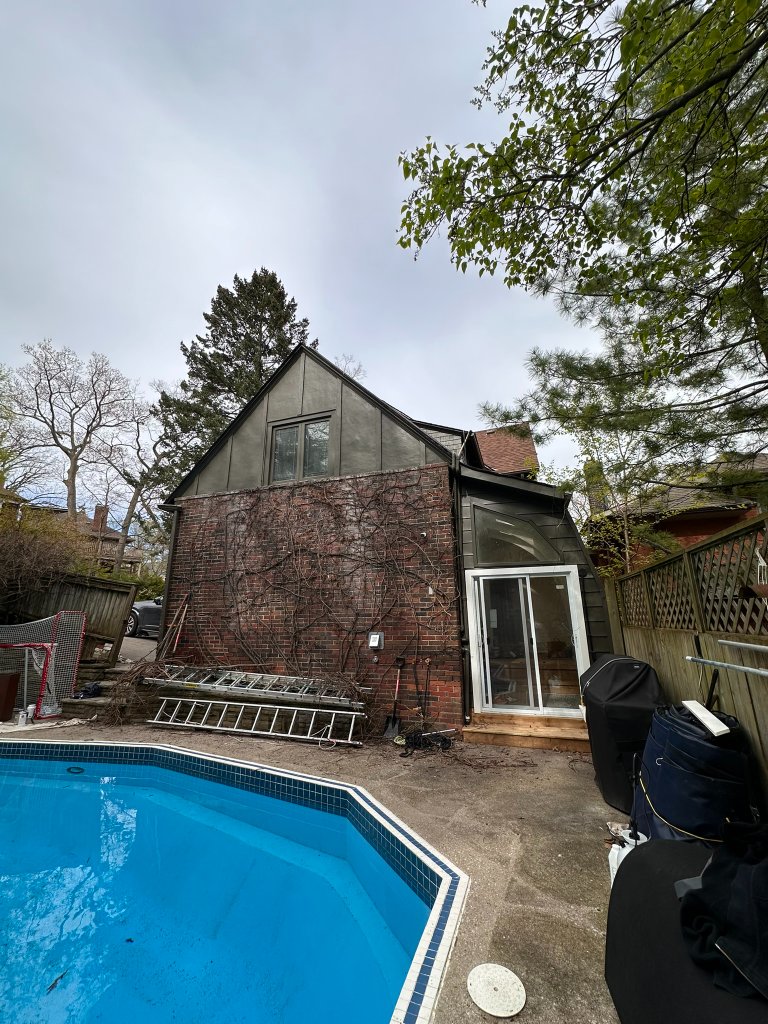 Green board and batten accent wall