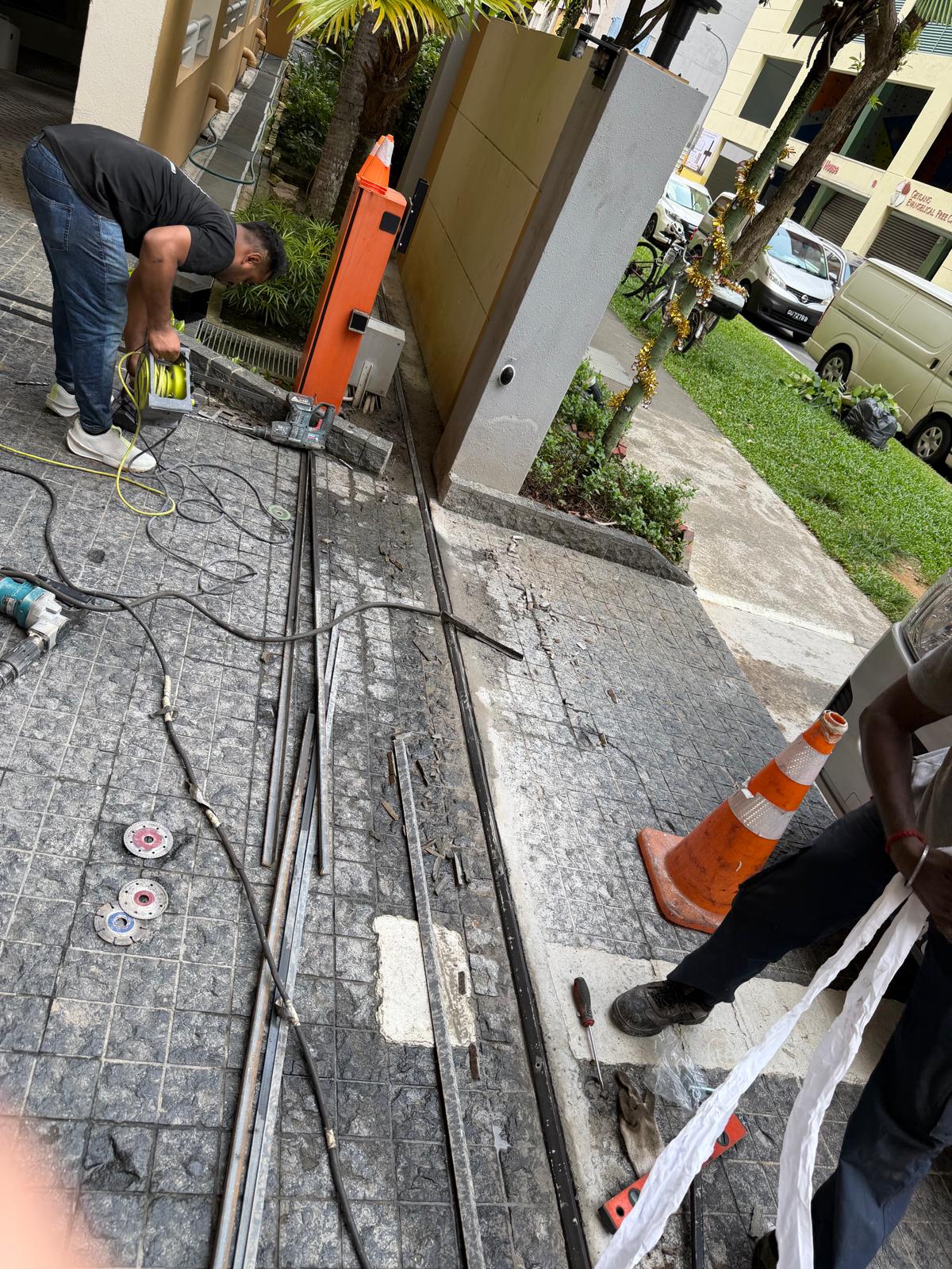 Sliding Gate Track, Gear Track, Roller & Motor System Replacement — New Metal Floor Track Laid Out