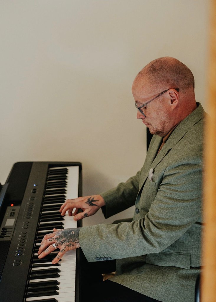 Live piano music performer Rob Price playing digital piano at weddings