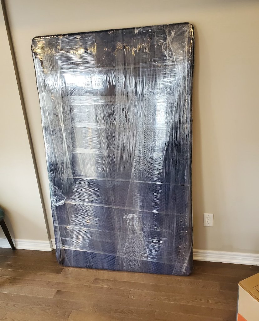 Mattress safely wrapped for moving