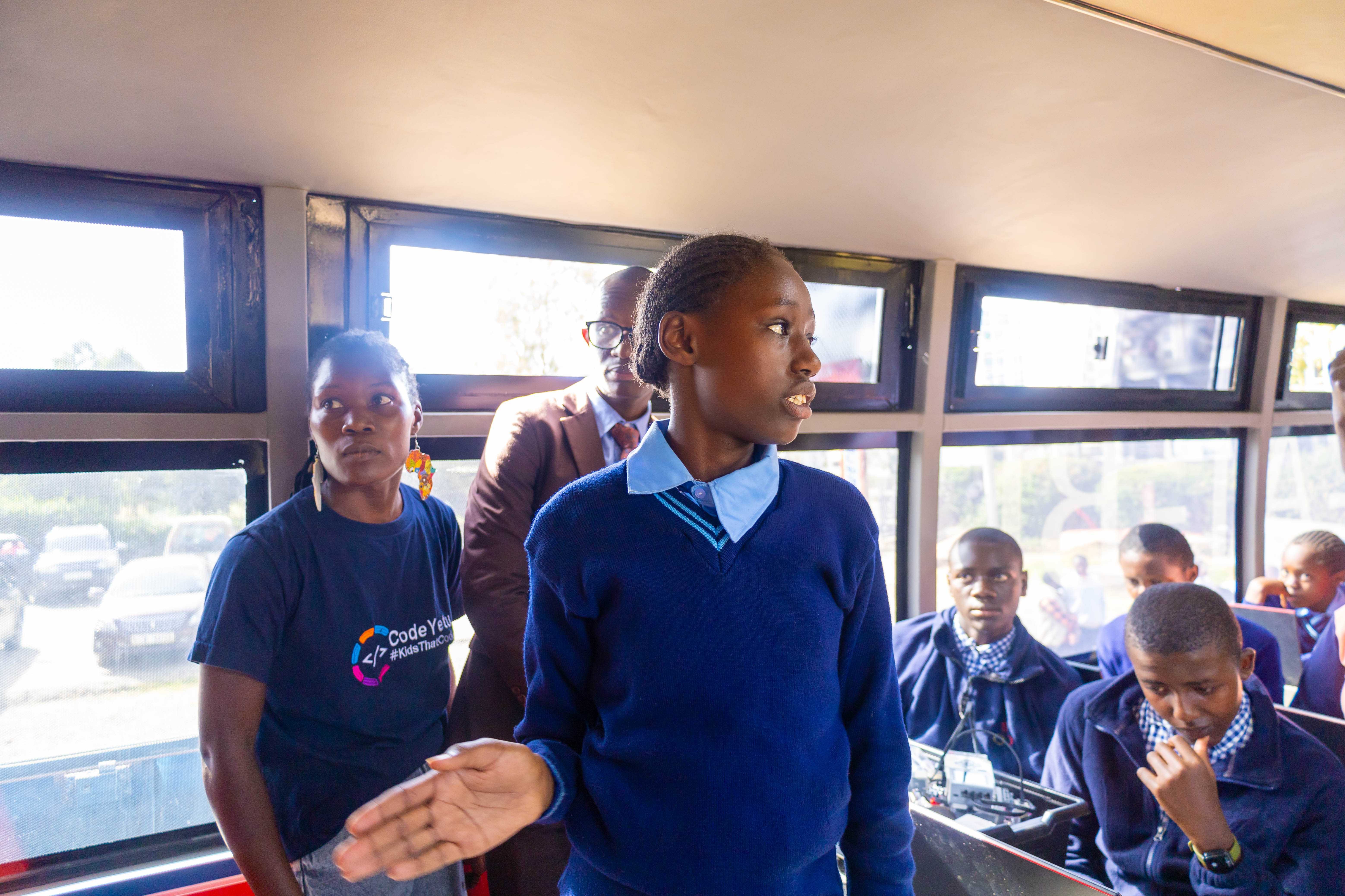 Student presenting inside the Digi AI Bus workshop