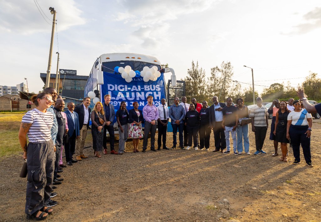 Celebration group photo at the Digi AI Bus launch event