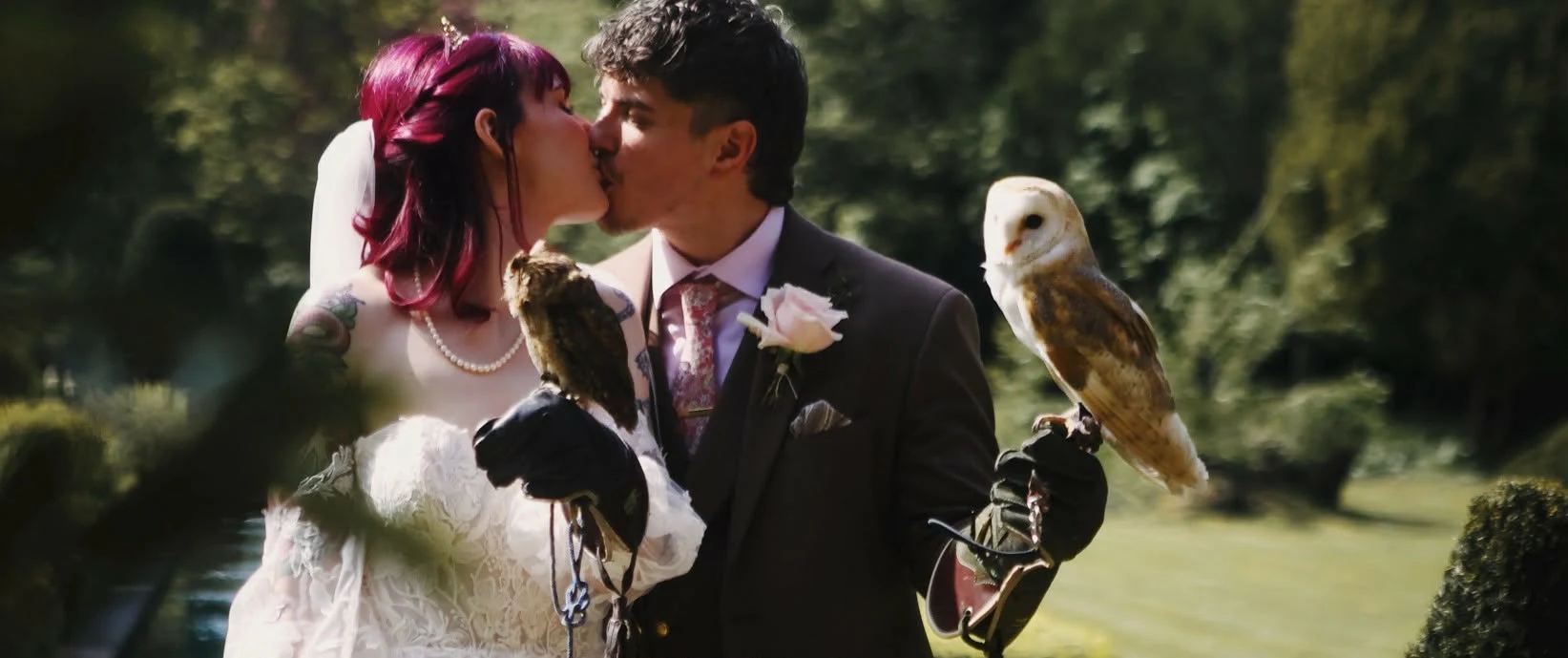 Holly & Rich with their owl ring bearer