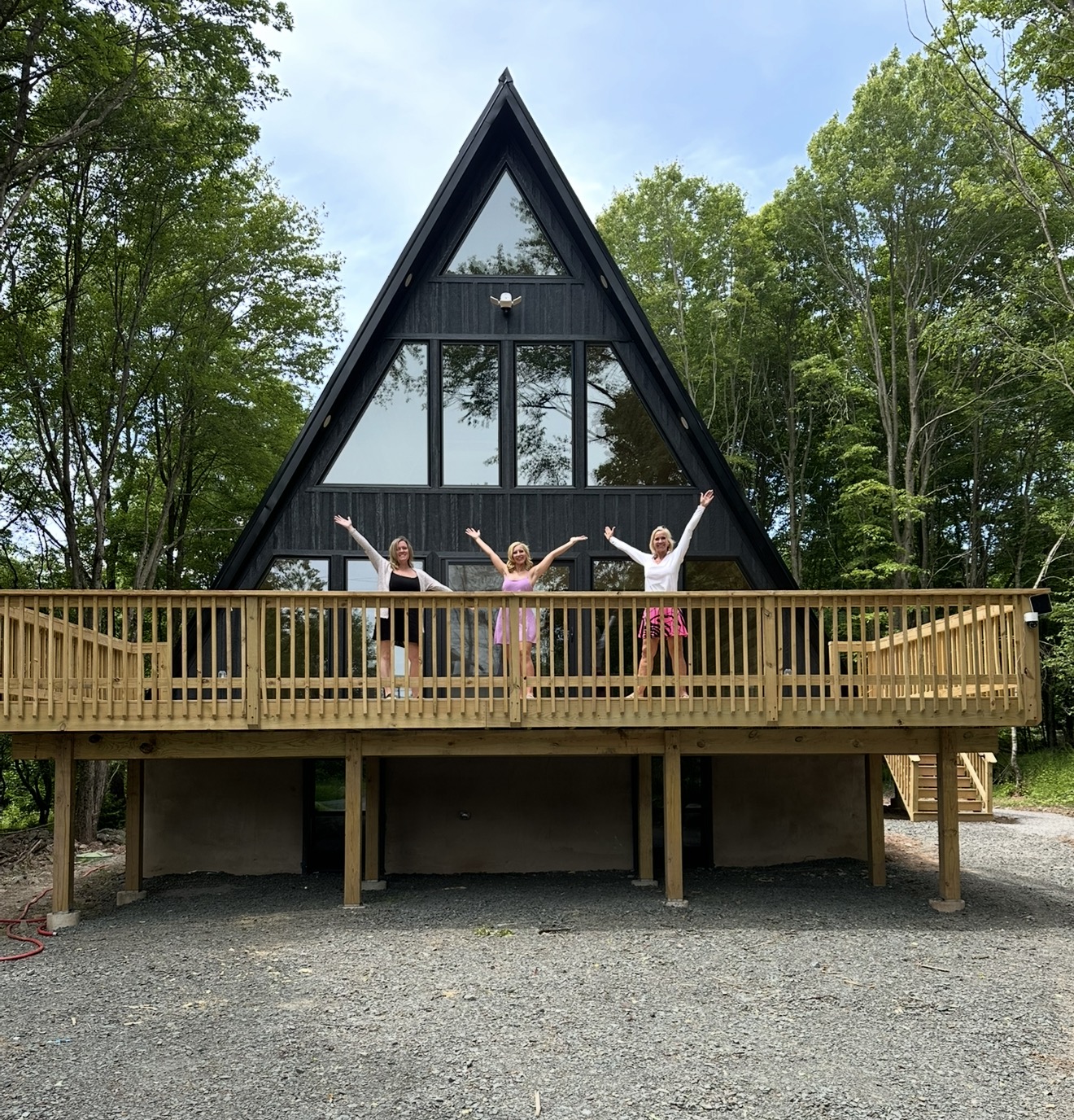 Black-stained A-frame with expansive deck