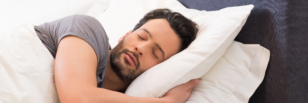 Man sleeping in bed