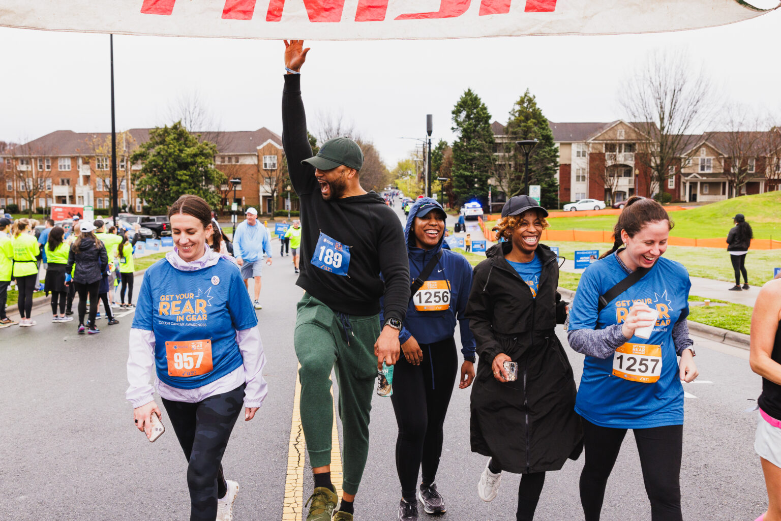 Get Your Rear in Gear race participants crossing the finish line