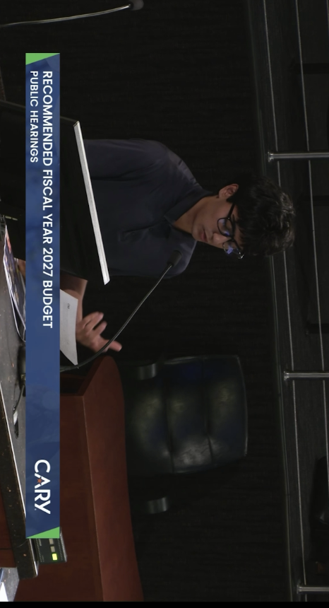 Speaking at the podium during the FY2027 Budget Hearing