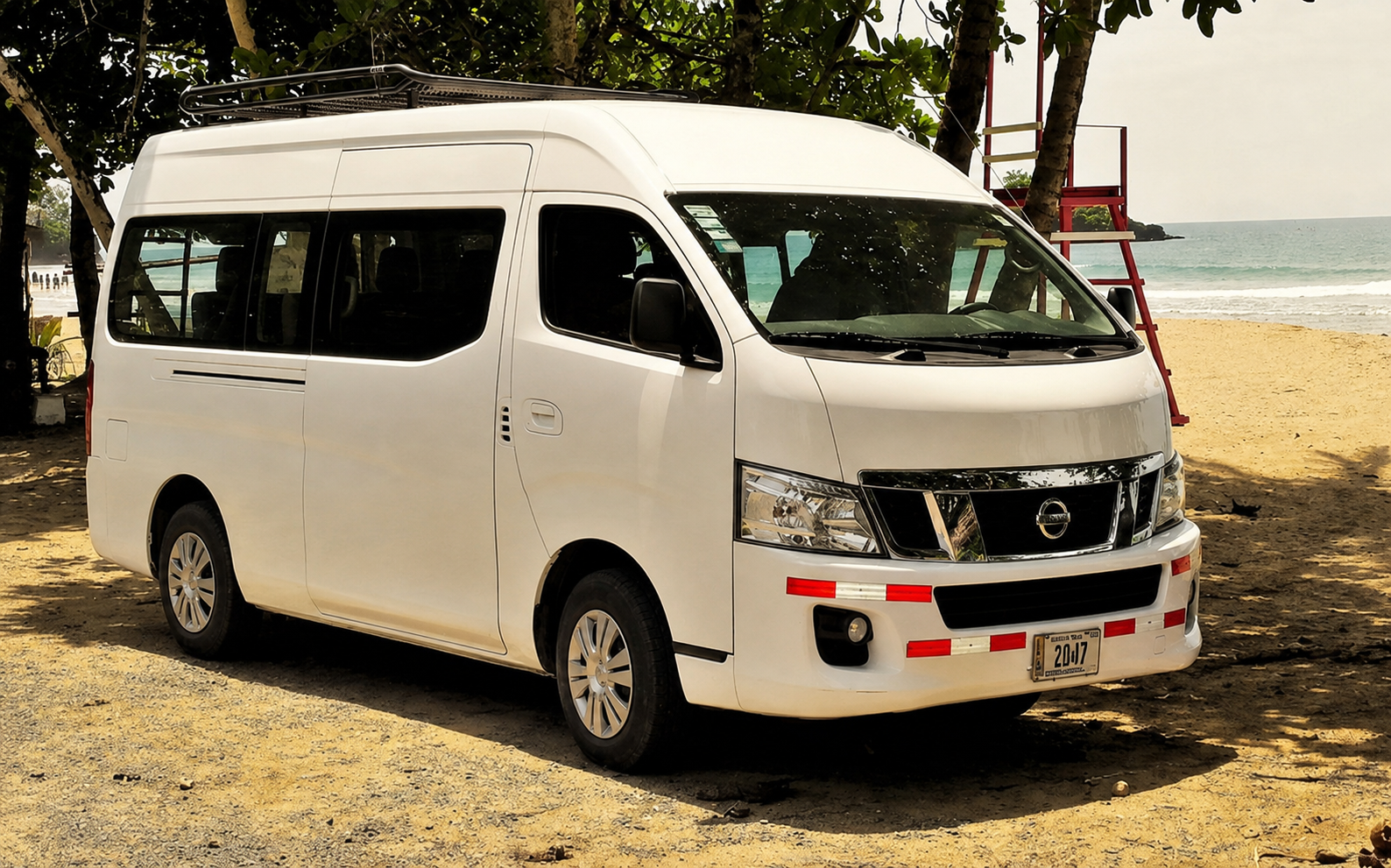 Shuttle van parked on the beach in Bocas del Toro