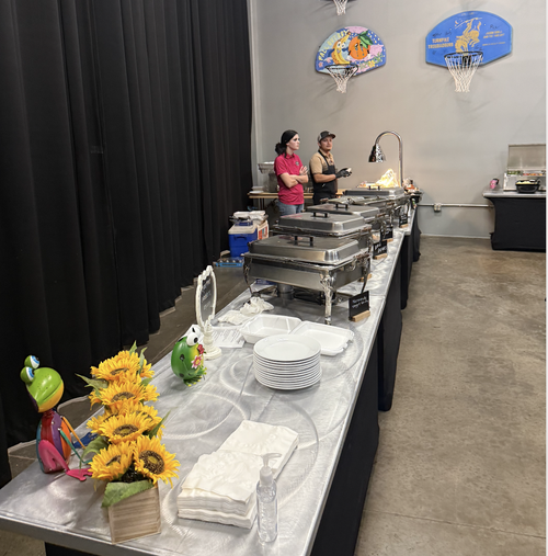 Buffet serving line staffed by the Falcone's team