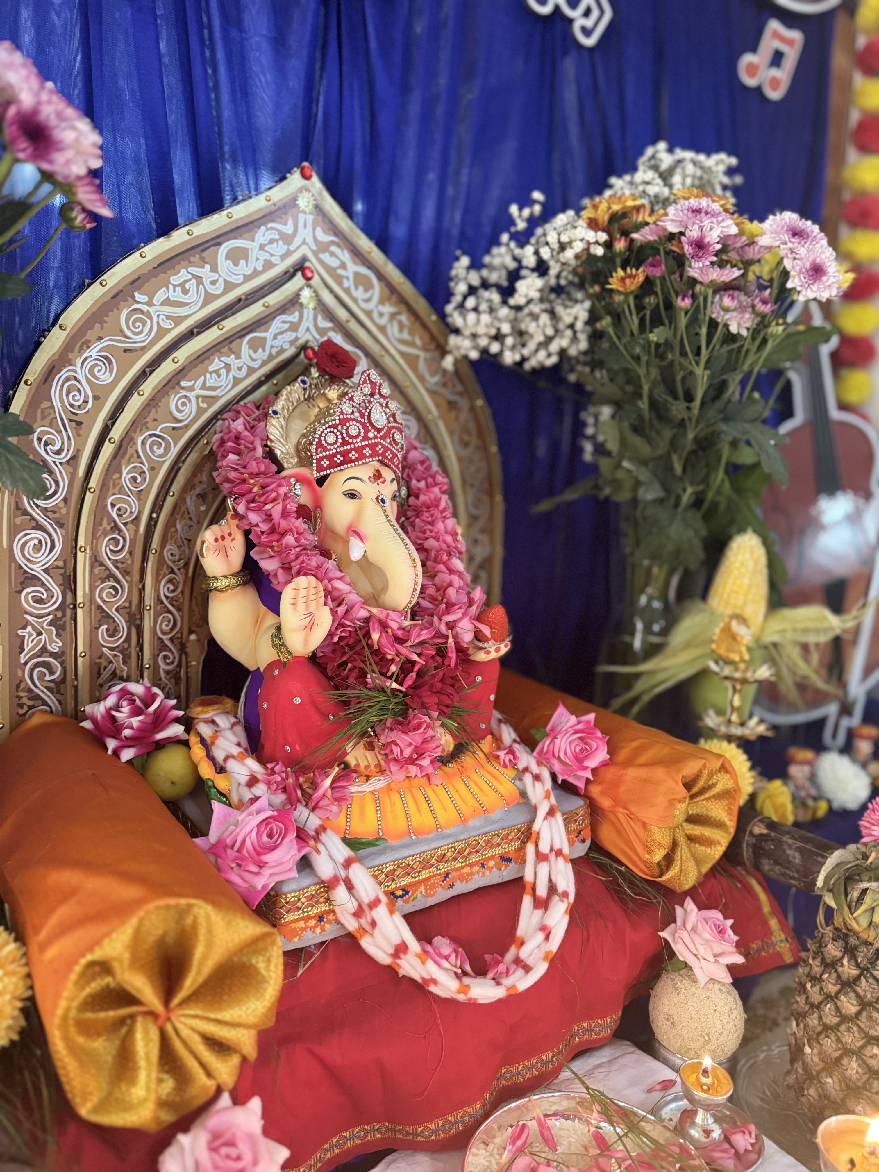 Lord Ganesha idol adorned with flowers — Happy Gowri Ganesha Festival from Gowda Kitchen