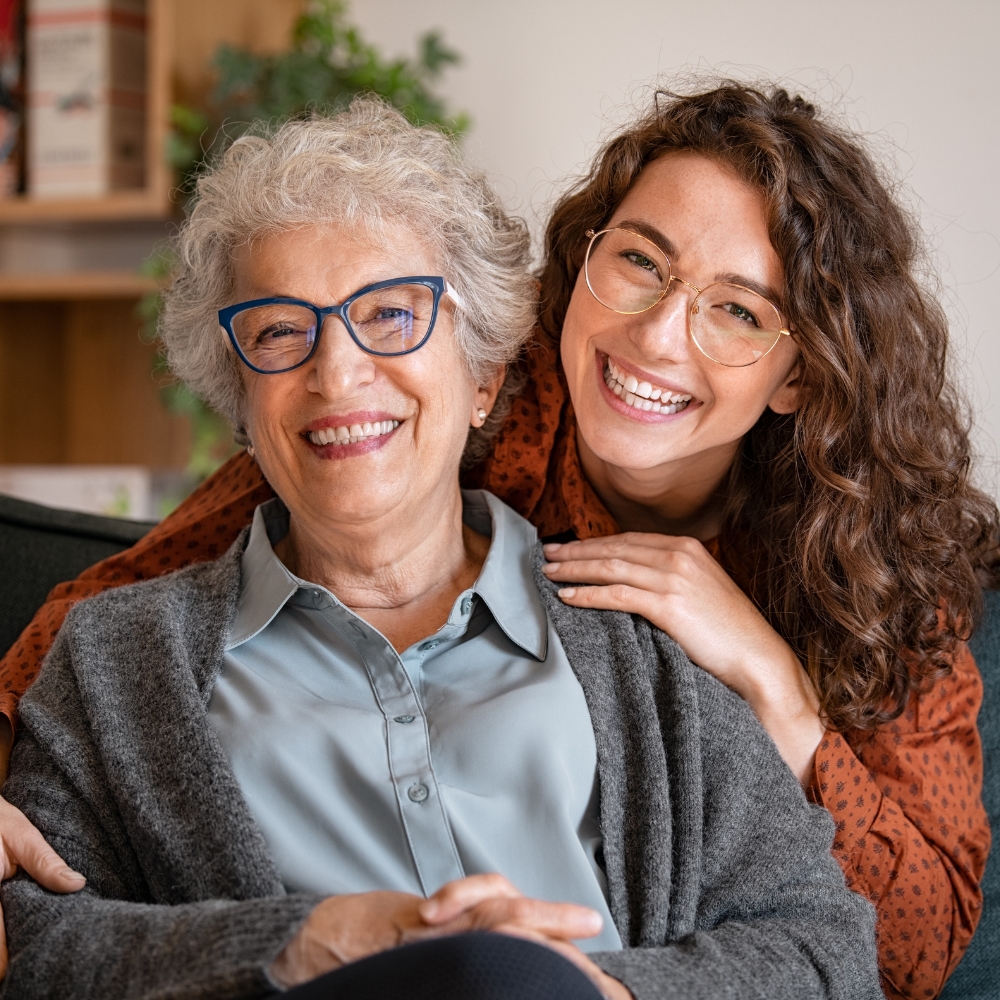 Mother and daughter laughing together