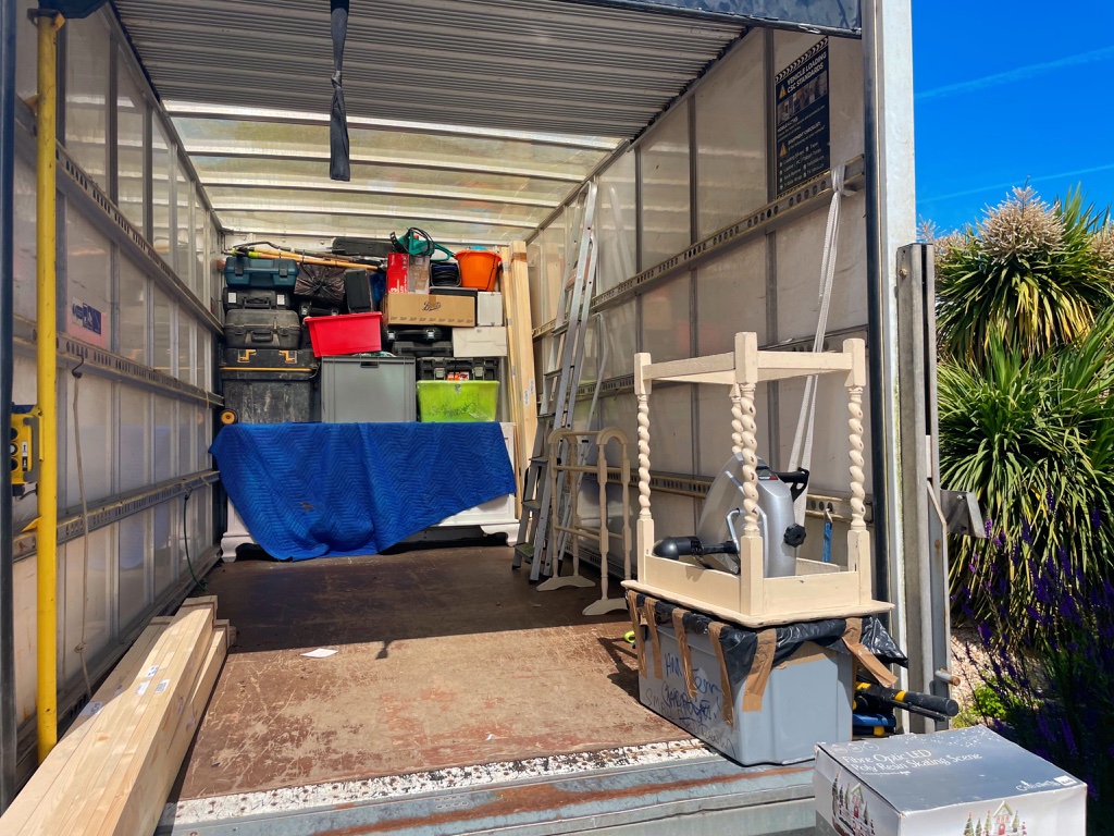 L&K Removals truck interior loaded with household items
