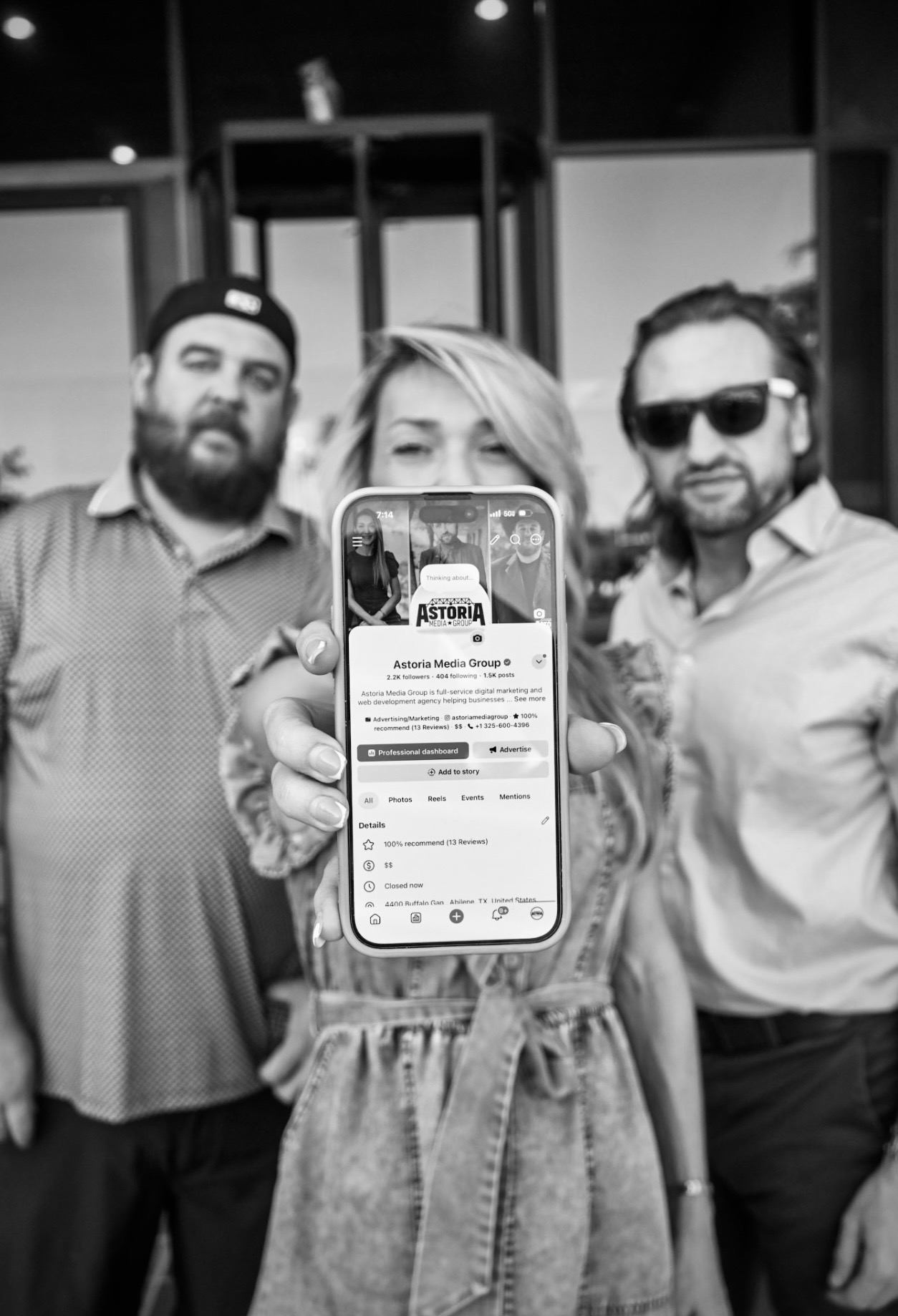 Astoria Media Group team reviewing their Instagram profile