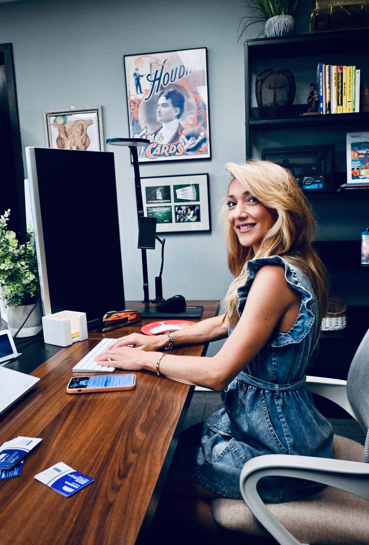 Astoria Media Group team member at her desk