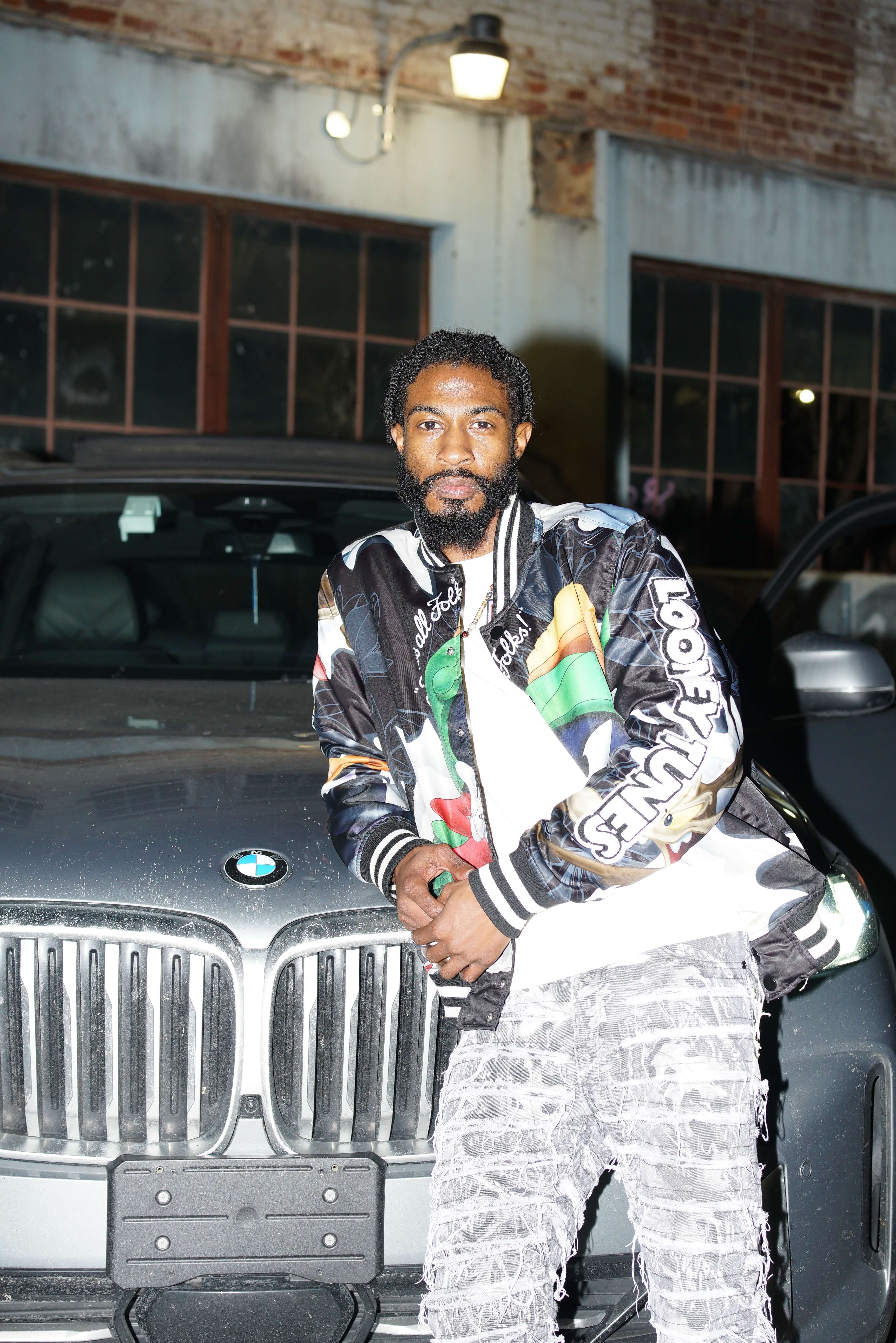 Creator posing with BMW at Hype Creators Camp 2026