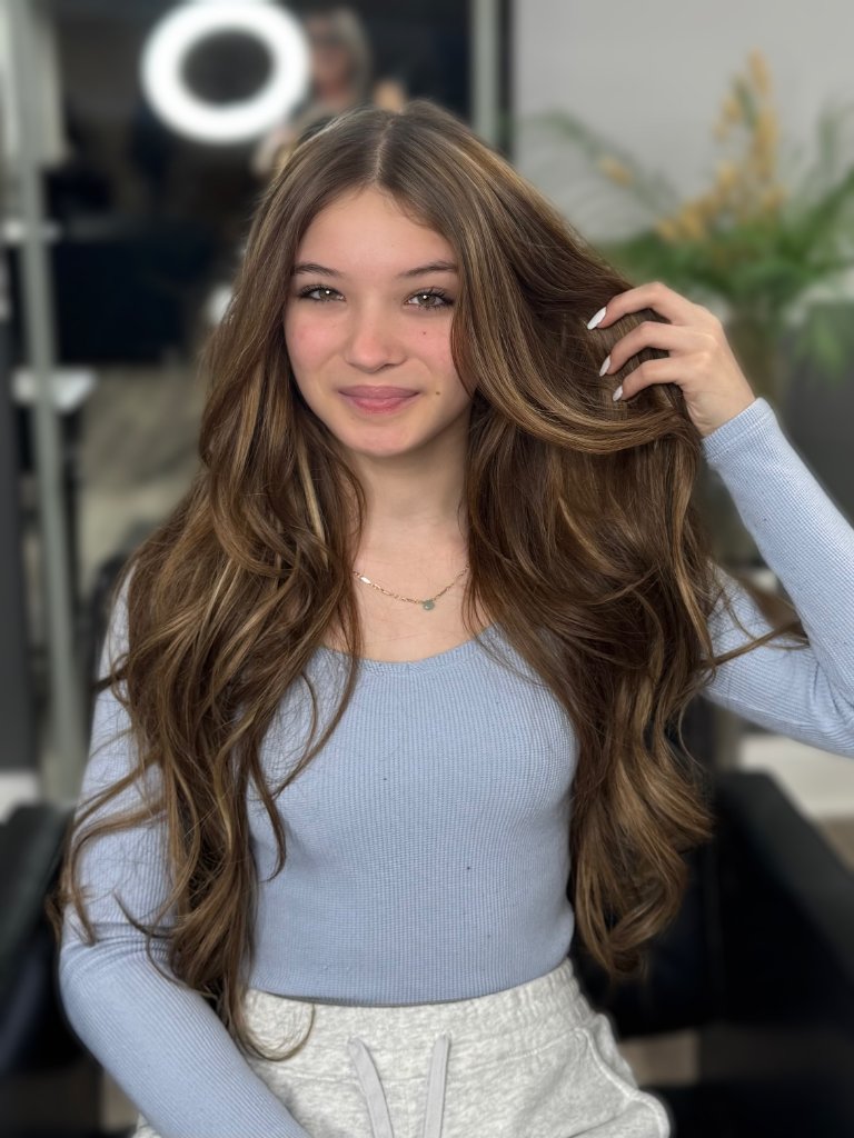 Long wavy highlighted brunette hair — NYHH Slavic Standard extensions