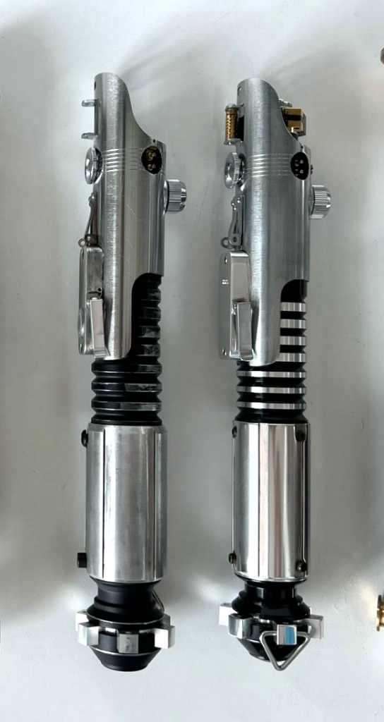 Vader's Vault's Derelict vs 89sabers' Derelict - pic taken from a sales post by Delon Mann on 15 April 2026 in the Vault facebook group: https://www.facebook.com/photo?fbid=2761276410875538