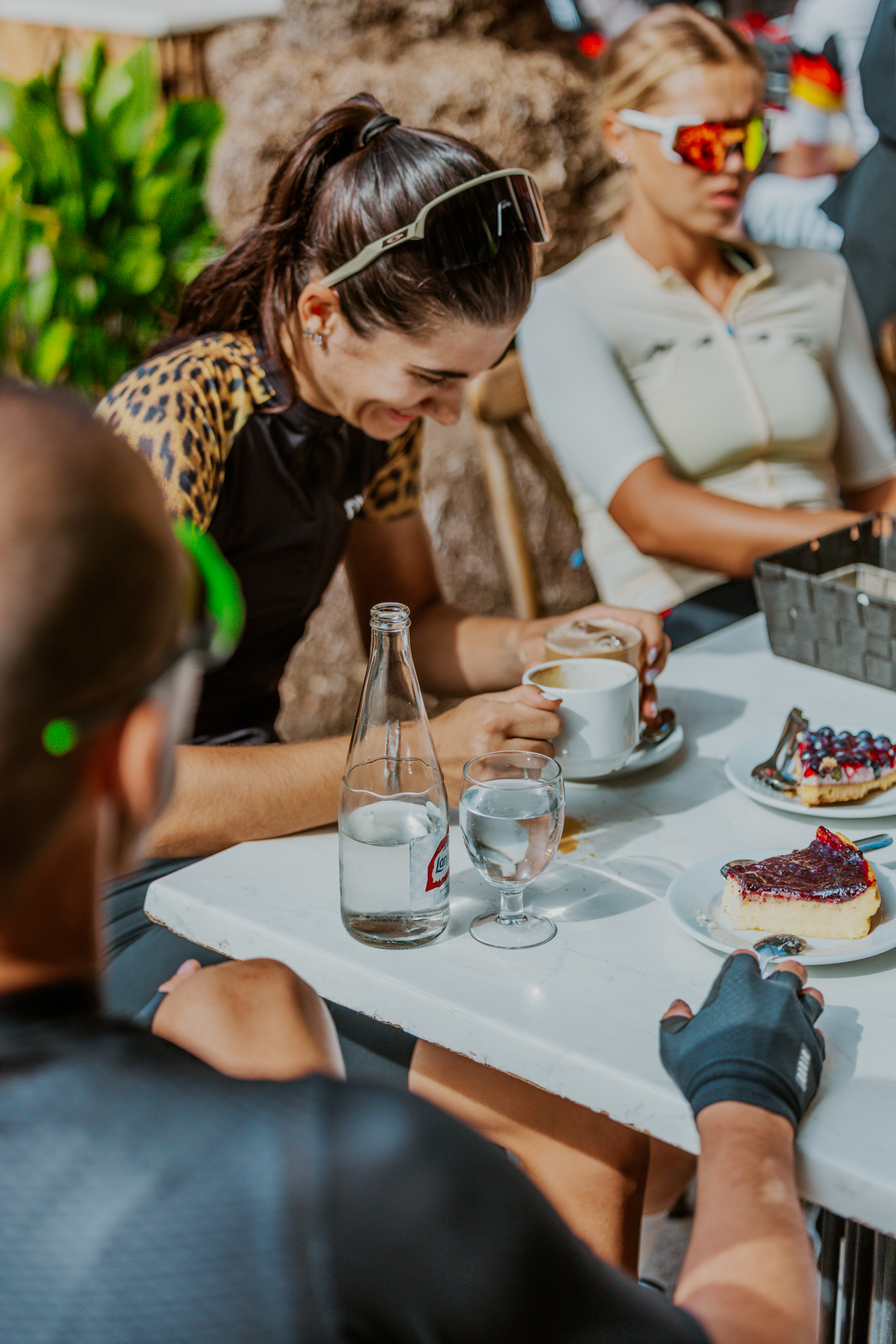 Cyclists enjoying a coffee stop together in Mallorca